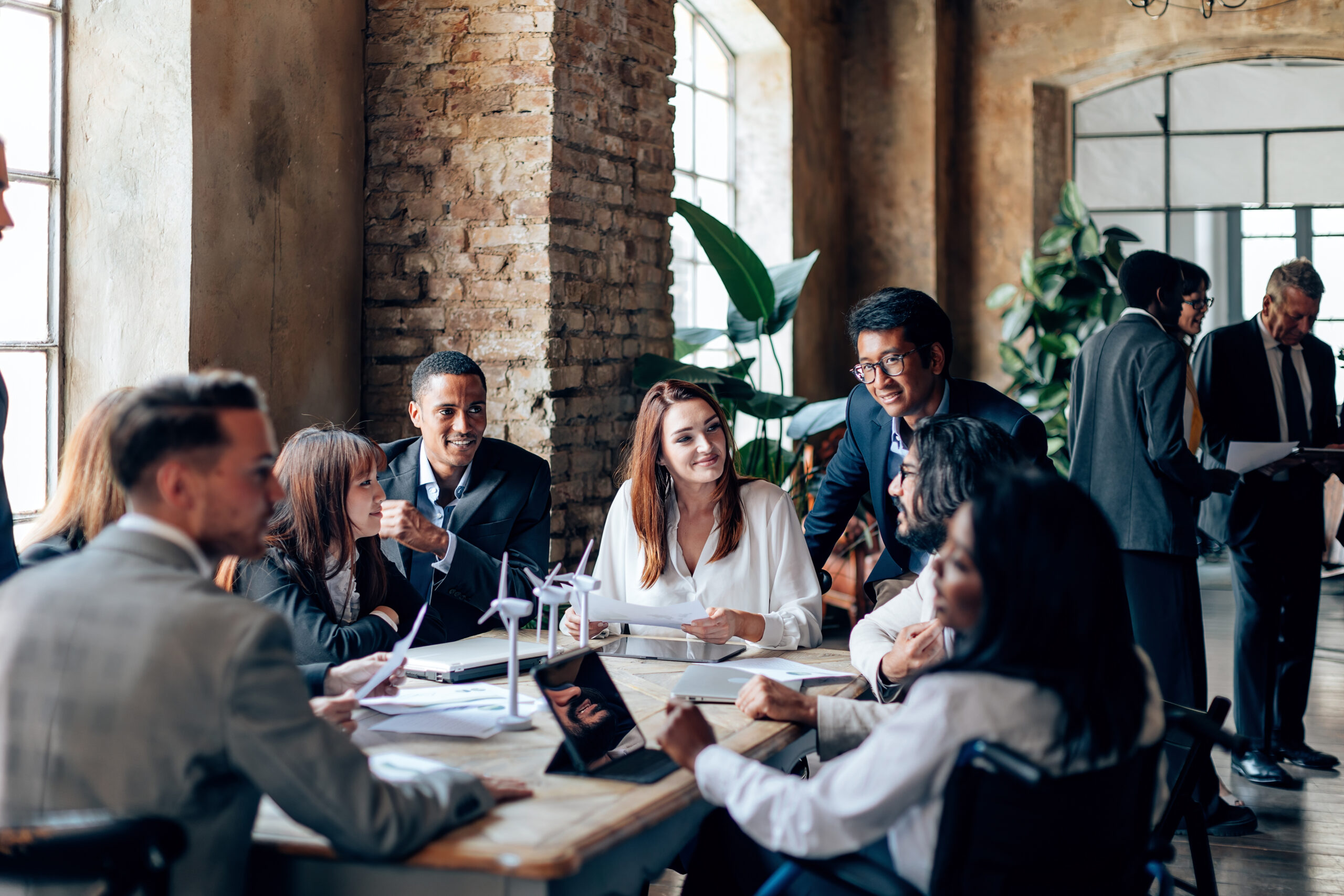 team of engineers working on the development of wind turbines for energy development